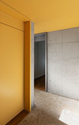 yellow, concrete and stone architecture with geometric shapes, photography of residential project 