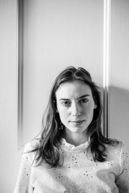 portrait photography of a young woman in interior, sunlight artist fashion designer natural light 