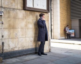 business man in central London talking on phone 