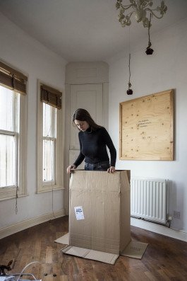 portrait photography of a young woman artist in interior, editorial photography 