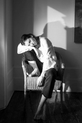 portrait photography of a young woman in interior, sunlight 