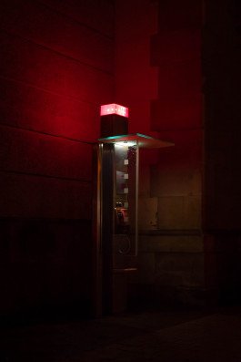night photography nachtfotografie urban landscape telephone booth with red light