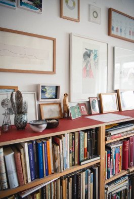 interior of living room shelves paintings 